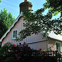 rosa Haus mit Blumen rosa Haus mit Blumen