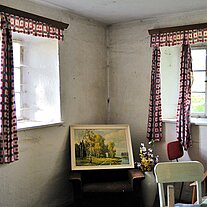 Wohnzimmer mit Sessel und Bild Wohnzimmer mit Sessel und Bild